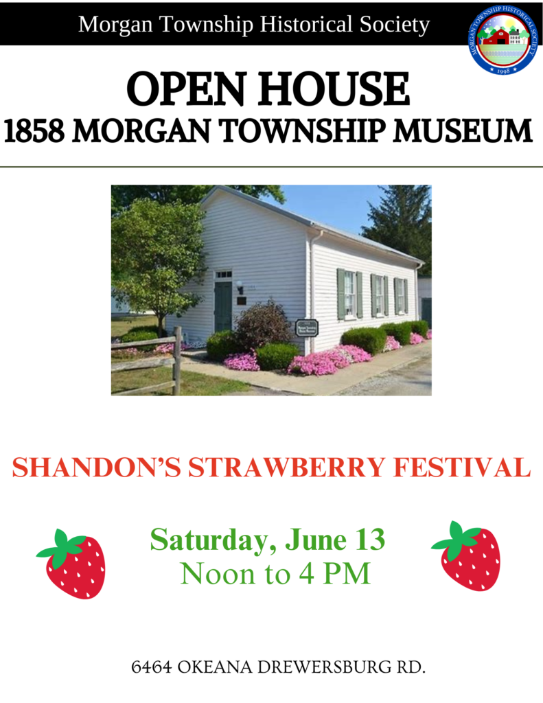 Flyer for a Morgan Township Historical Society open house at the 1858 Morgan Township Museum. The flyer has a black header with the organization name and the society logo in the top right corner. Large bold text reads “OPEN HOUSE” and “1858 MORGAN TOWNSHIP MUSEUM.” Below is a photo of a small white historic building with green shutters, landscaping and pink flowers. Red text announces “Shandon’s Strawberry Festival.” Green text lists the event date and time as Saturday, June 13 from Noon to 4 PM. Decorative strawberry graphics appear on both sides of the date. The address at the bottom reads 6464 Okeana Drewersburg Rd.
